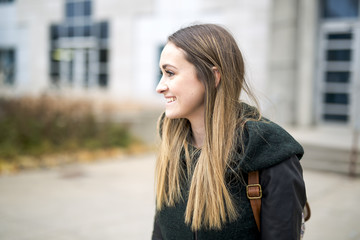 Fototapeta na wymiar Portrait Of Female University Student Outdoors On Campus