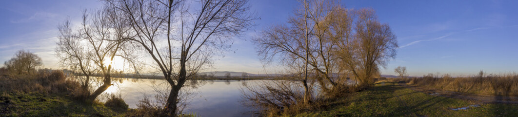 Beautiful panorama by the river in winter
