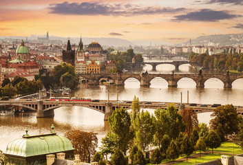 Naklejka premium View of Prague and Charles bridge at dawn, Czech Republic