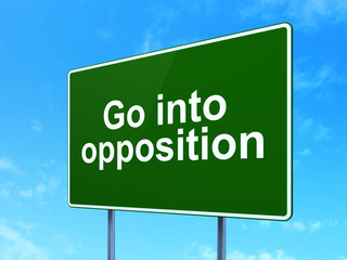 Political concept: Go into Opposition on road sign background