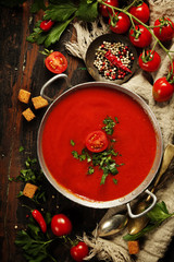 Homemade Tomato soup on wooden table