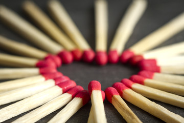 Heart made with matches