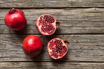 Pomegranates on wooden table