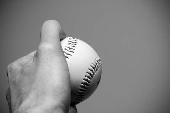 Hand Holding A Baseball Close Up