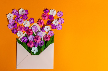 Envelope Mail, Blue cover with many little flowers on orange Background. Valentine Day Card, Love or Wedding Greeting Concept, Empty space