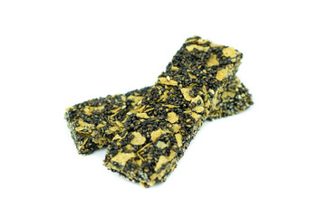 Healthy cereal bar with black sesame isolated on white backgroun