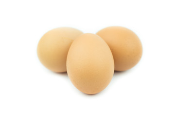 three eggs isolated on white background