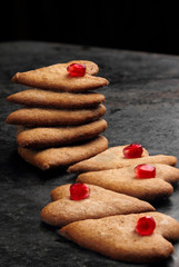 Christmas cookies in heart-shaped decoration with granate