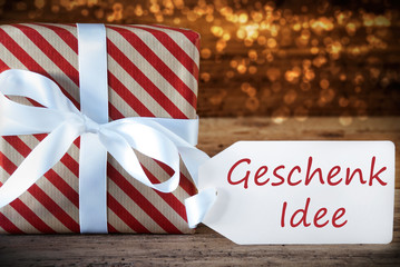 Fototapeta na wymiar Atmospheric Christmas Present With Label, Geschenk Idee Means Gift Idea
