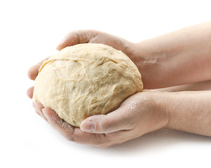 fresh raw dough in bakers hands