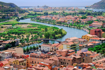 Fototapeta na wymiar View from above on the town Bosa and river Temo flowing into the