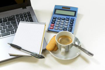 Coffee Break in Office / Businessman in office desk using computer. Coffee Break. View from above.