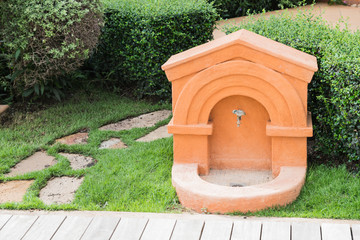 very old tap made from brash