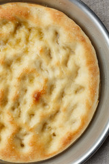 Home made focaccia in a cooking pan