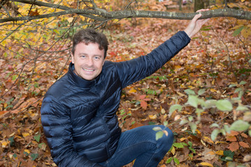 Handsome man in a natural environment yellow colored