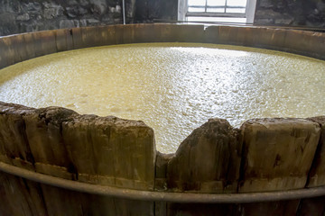 Mash in oak fermentation barrels