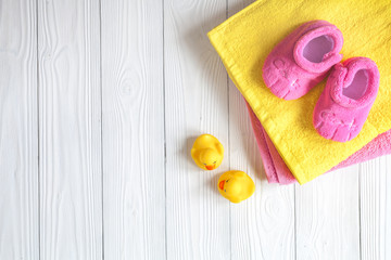 baby accessories for bath on wooden background