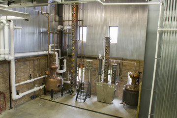 Copper still in bourbon distillery