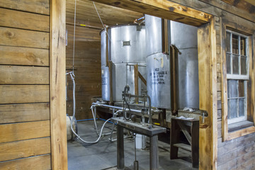 Bourbon distillery barrel filling room