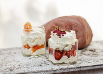 Strawberry and mandarin with cream dessert