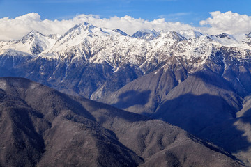 Beautiful mountain scenery of the Main Caucasian ridge with snowy peaks at late fall
