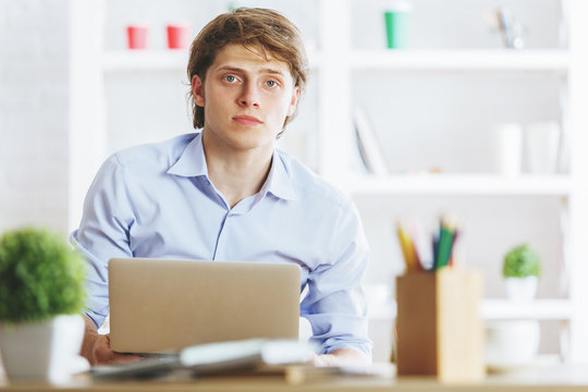 Portrait of man at workplace