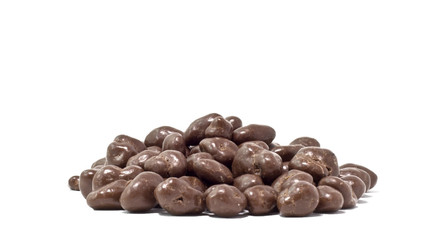 Front view of a pile of chocolate covered raisins on a white background.  Horizontal