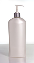 Lotion pump bottle. No label. Vertical.