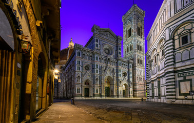 Fototapeta premium Florence Cathedral of Saint Mary of the Flower (Florence Duomo), Florence Giotto's Campanile and Florence Baptistery at night in Florence, Italy