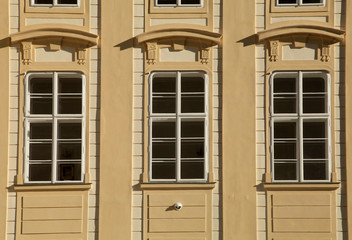 Classic windows and facade of building in Prague Castle