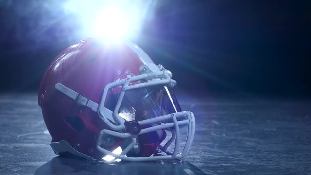 Helmet american football players in the smoke background. Clous up