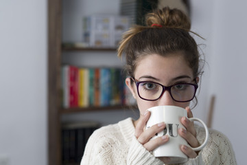 Portrait of teen with glasses.