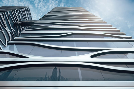 Contemporary skyscraper on sky background closeup