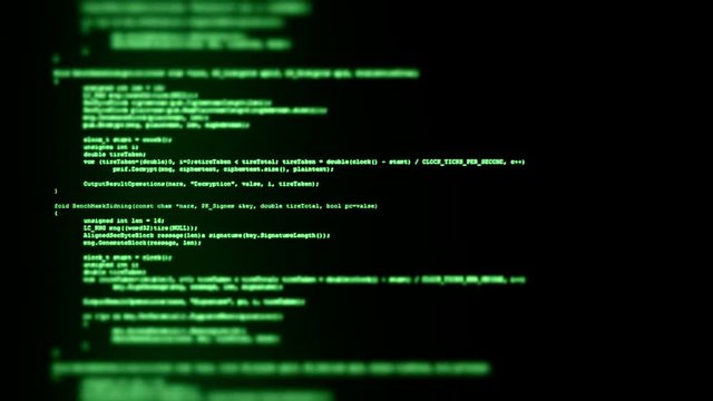 Showing a flow of source code text (instructions for a computer program) on a PC screen in tilt-shift. Green characters, black background.
