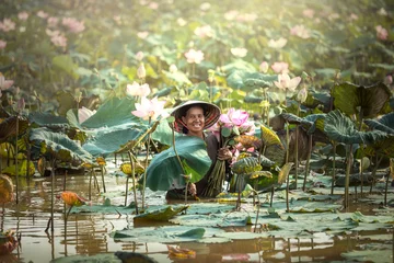 Fotobehang Growers lotus © EmmaStock