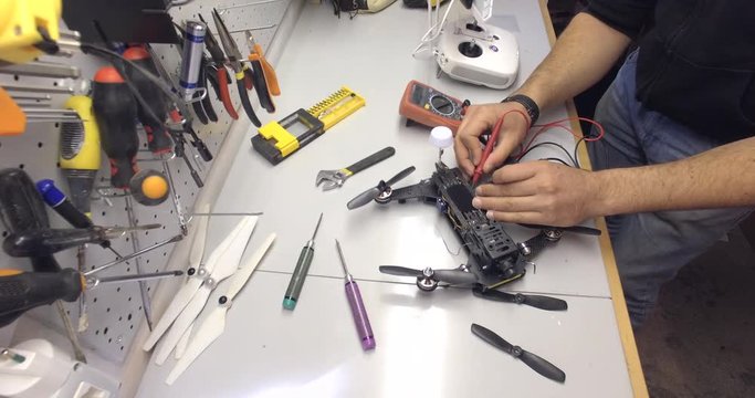 repair maintenance drone,  Control connections, check with multimeter, screwdrivers, tools, propellers