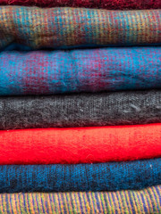 Close up of Stacked Yak Wool Scarves