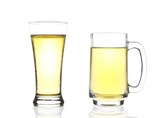 dual or two frosty lager light beer in clear glass set with stea