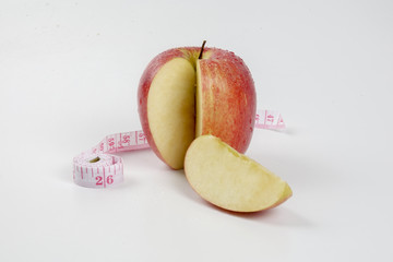 apple and stethoscope on white. Medical concept