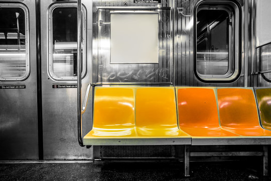 New York City subway car interior with colorful seats © littleny