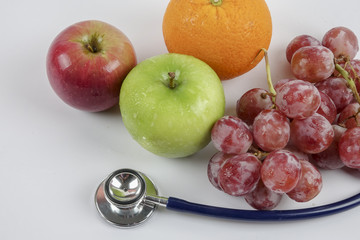 mixed fruit with stethoscope. Medical concept