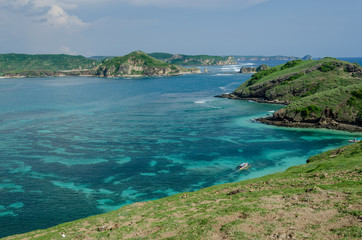 Fototapeta na wymiar Different tones of blue around the coast of Lombok