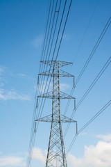 high voltage pole with blue sky