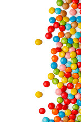 colorful chocolate buttons on white background