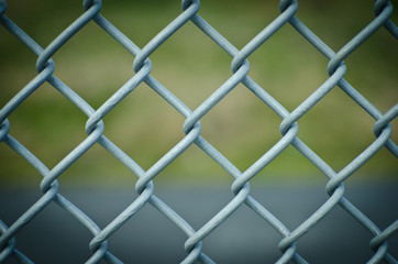 Naklejka premium Closeup of diamond mesh fence