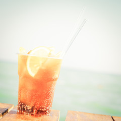 Concept of luxury tropical vacation. One Cuba Libre cocktail on