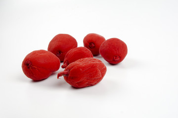 Red pickles isolated on white