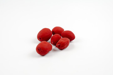 Red pickles isolated on white