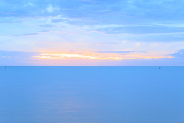 sunset at sea or ocean, with quiet feel or blue tone, sea landscape.