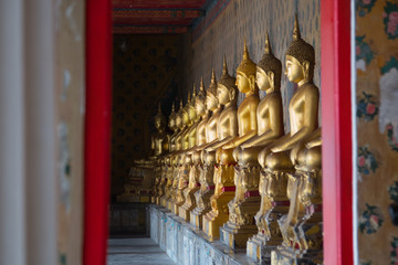 Row of Buddha gold  and thai art architecture in Wat Arun buddhist temple in Bangkok, Thailand.Photo taken on: 21 November , 2016